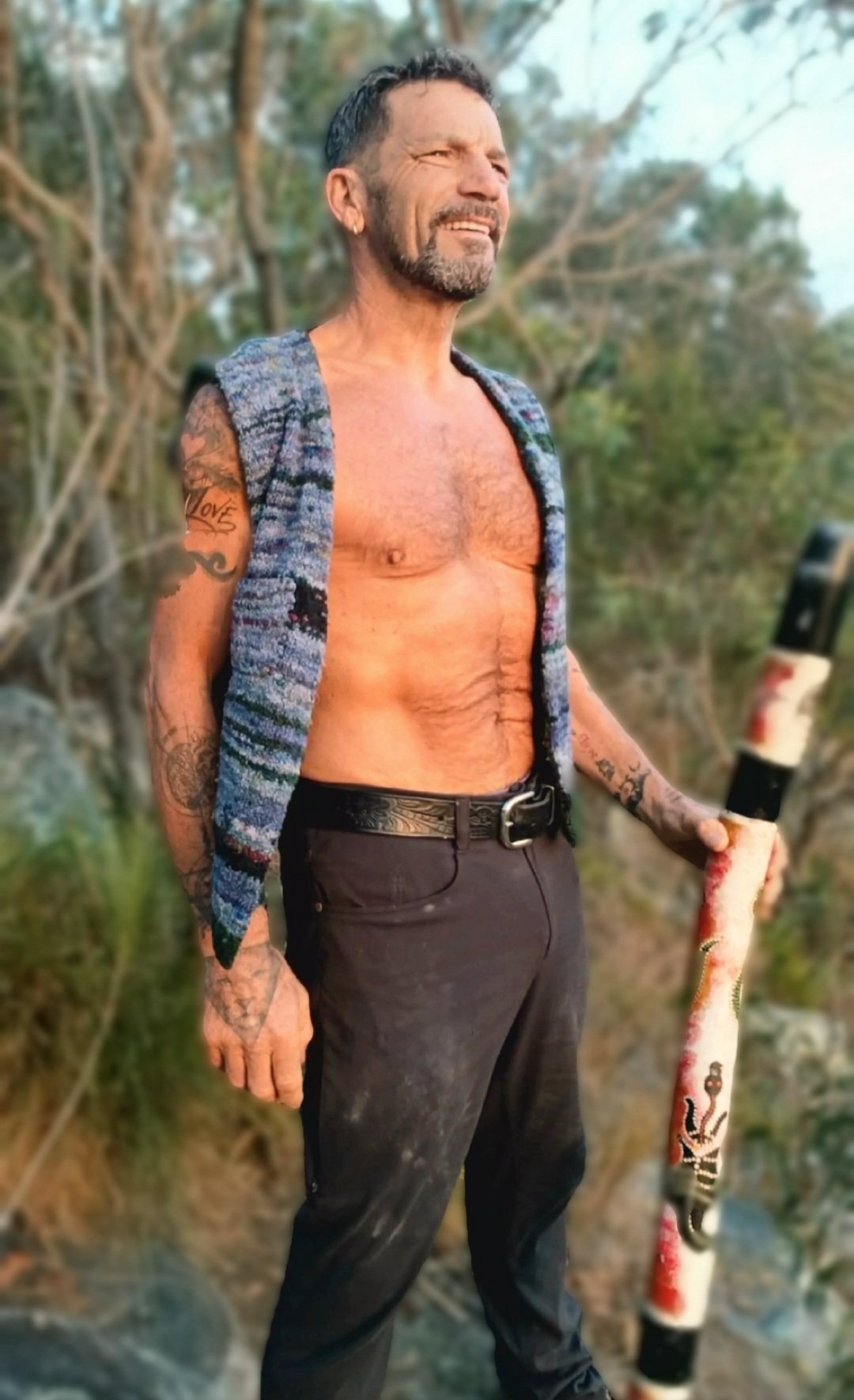Michael Bennett with his didgeridoo, sacred sound in THINK LOVE