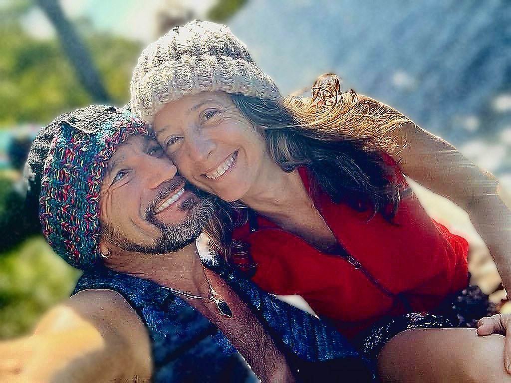 Michael and Joy cheek to cheek in the sunlight